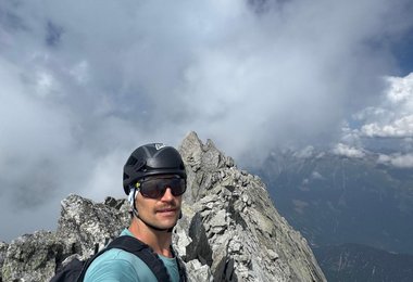 Martin on top of Piz Badile - @MartinSieberer