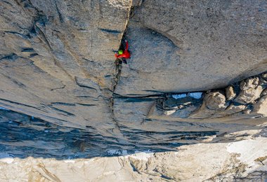 Alex Honnold soloing high up on the American Direct on Les Drus, Chamonix (c) Renan Ozturk / Red Bull Content Pool